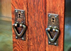 Hand hammered copper pulls.